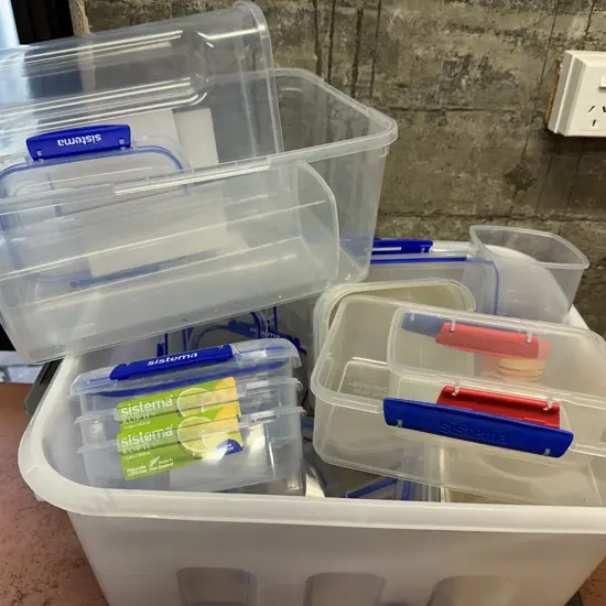 Lidded Clear Bin Of Assorted Sistema Ware